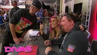 Natalya and Jim 'The Anvil' Neidhart sign autographs at Axxess: WWE Total Divas, July 14, 2015