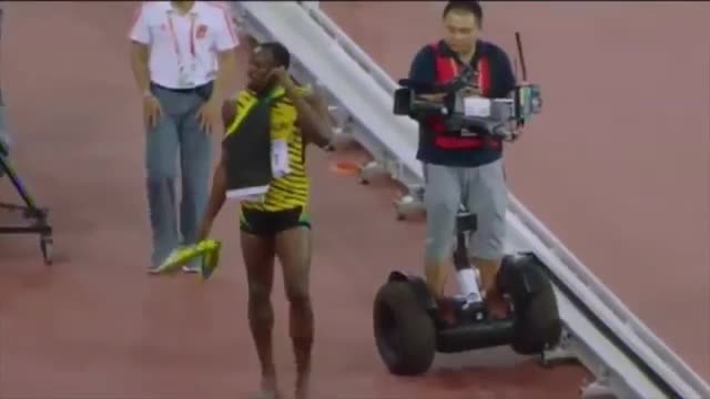 Usain Bolt Wiped Out By Segway After Winning 200m Title