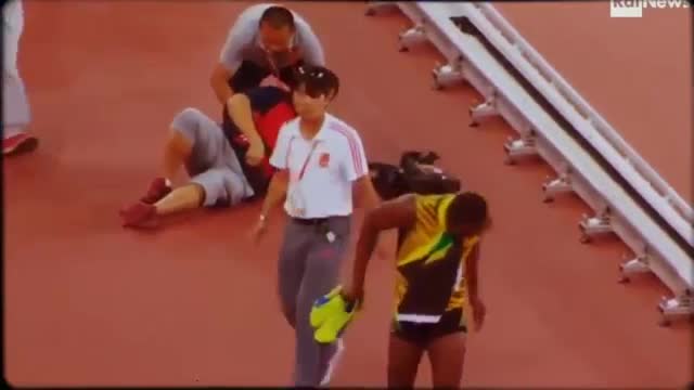 Epic Fail Usain Bolt Taken out by Camera Man After Winning 200M Title at World Championships 2015