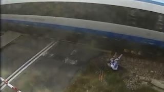 Cyclist Survives Collision with Train