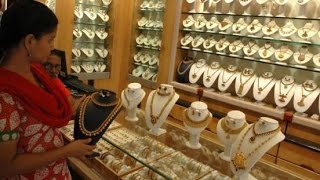 Gold slips from 3 month high, silver weak on global cues