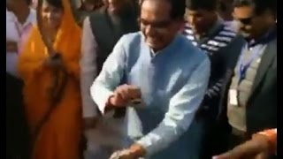 MP CM Shivraj Singh Chouhan shake a leg with tribal dancers