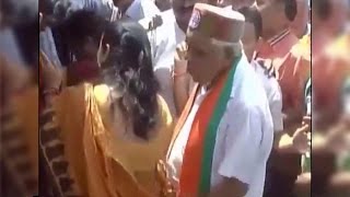 MP Home Minister Babulal Gaur inappropriately touch a woman,