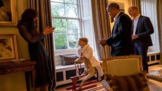 Prince George greets Obamas in his bedtime robe