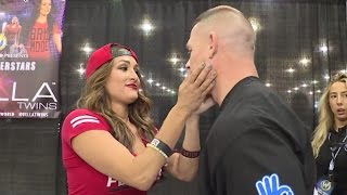 John Cena searches out Nikki Bella for a kiss at Wizard World Philadelphia: June 7, 2016