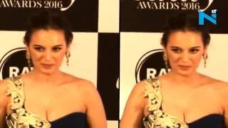 Evelyn Sharma's assets spills out of her one shoulder gown
