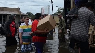 At least 8 dead, 40,000 homes flooded in Louisiana