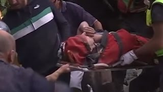 Raw: Rescuers Pull Survivor from Rubble in Italy