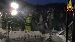 Raw: Italian Rescuers Pull Victim From Rubble