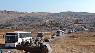 Raw: Syrian Evacuees Leave Daraya for Shelter