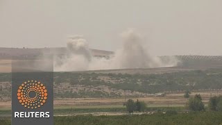 Explosions rock Syrian border as Turkey presses operation