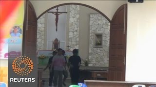 Man tries to attack priest give mass in Indonesia