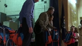 Flint Kids Surprised With Supply-Filled Packs