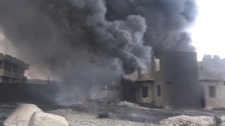 Iraqi town battes raging fires left by IS jihadists