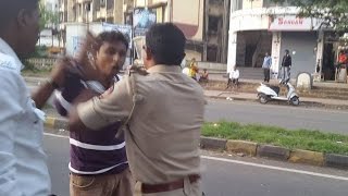 Traffic Police caught assaulting young man in public