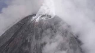 Mexico's Colima volcano spews smoke and ash