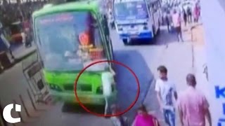 CCTV Footage: Man busy on mobile phone gets hit by speeding bus
