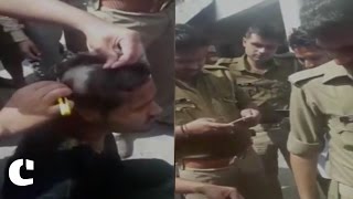 Anti-Romeo squad shaves head of a man in front of the police