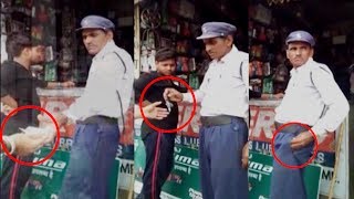 Caught on camera: Traffic cop taking bribe from biker