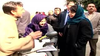 Mehbooba  hands over motorized bicycles among specially abled youth