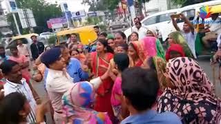 Viral Video of Ahmedabad Police Officer hitting women