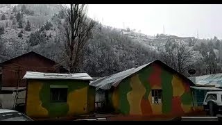 कश्मीर में पहाड़ों पर फिर बर्फबारी, निचले इलाकों में बारिश से ठंड बढ़ी