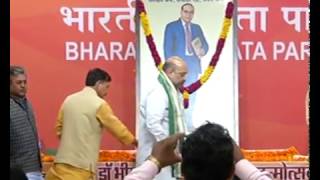 Shri Amit Shah pays tribute to Baba Saheb Ambedkar on his Birth Anniversary at BJP HQ.