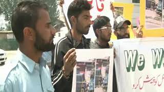 Family of slain youth run over by police vehicle, protest in Srinagar