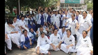 Nursing staff observes 1 hr token strike, hold protests in Jammu