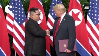 Donald Trump, Kim Jong Un shake hands at Singapore Summit
