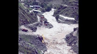 Floods wash away dam in Doda