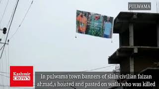 Banners of slain civilian Faizan Ahmed pasted on walls in Pulwama