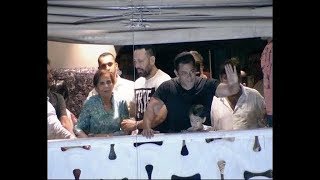 Salman Khan waves at fans from Galaxy Apartment with his family