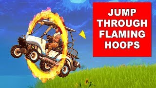 Jump through Flaming Hoops with a shopping cart or ATK - Fortnite Season 5 Week 4 Challenges