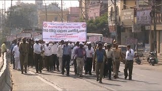 Rtc Workers Of Midhani Bus Depot Had Rally On Follow Traffic Rules.