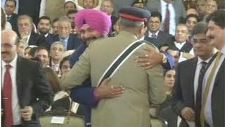 navjot singh sidhu hugs pak army chief qmar javed