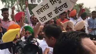 sad workers protest against sidhu