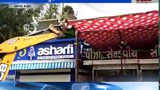 Illegal constructions demolished in Law garden food court in ahmedabad