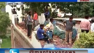 corporation destroyed Sanjiv bhatt'sillegal wall Ahmedabad