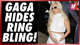 fame hollywood​​ Lady Gaga Hides Her Engagement Ring as she lands In LA