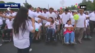 Indian Spinal Injuries Centre organises a wheelchair candle march at Rajpath