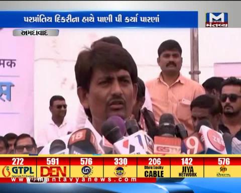 Alpesh Thakor ended his fast by drinking water offered by a girl from a migrant family