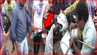 Snake Catcher Throws Snake Rescued From A Motorbike Onto Crowd! Freaks Out People