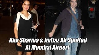 Imtiaz Ali & Kim Sharma Spotted At Mumbai Airport