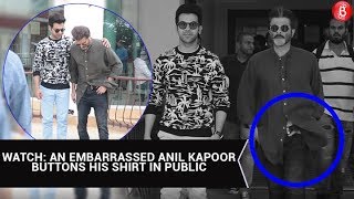 An embarrassed Anil Kapoor buttons his shirt in public | Bollywood
