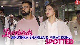 Anushka Sharma & Virat Kohli make a stylish appearance at the airport!