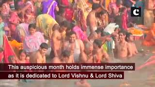 Devotees take holy dip in river Ganga on Kartik Purnima