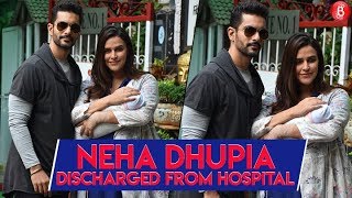 Proud parents Neha Dhupia and Angad Bedi take their new born baby home.