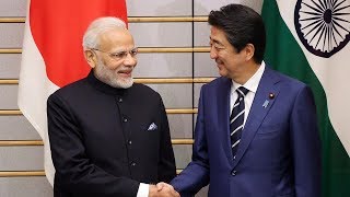 India, Japan ink six pacts after Modi-Abe talks; agree to hold '2+2' talks