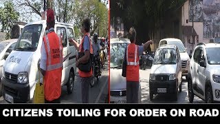 Citizens toiling for order on road